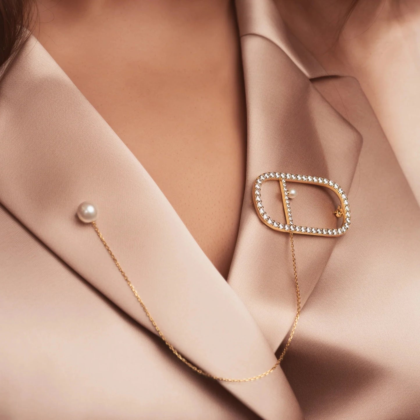 Symphony signature brooch